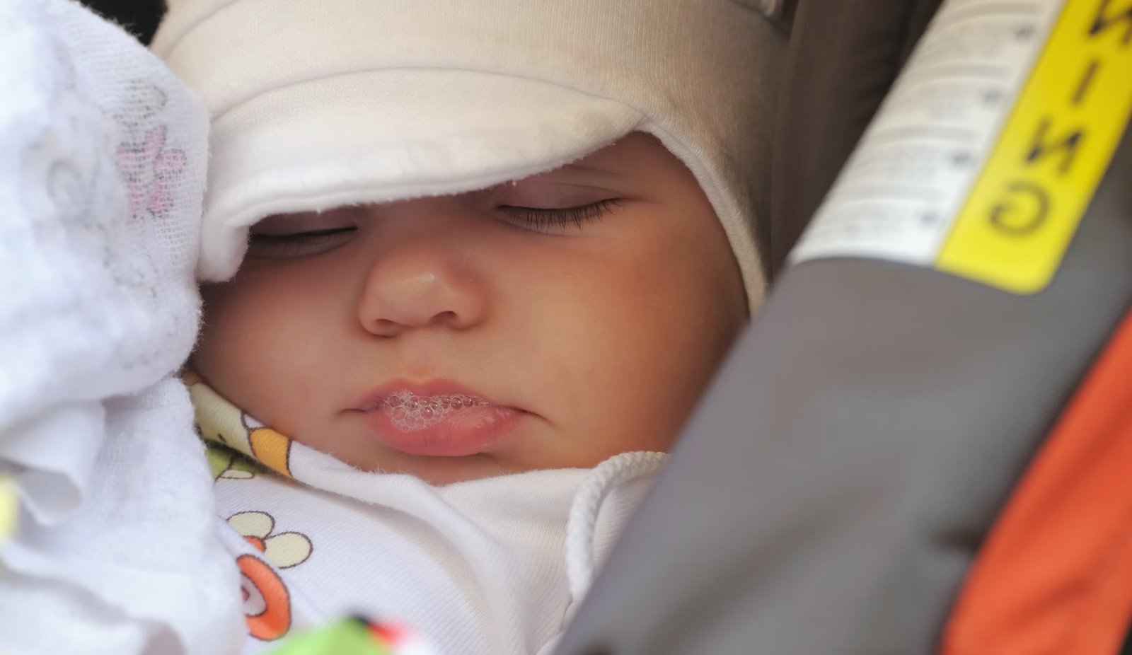 newborn saliva bubbles while sleeping